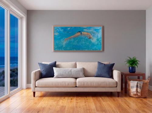 Living room with beige sofa, and a oil painting by artist Robert Gerson of a swimmer from his California Swim painting series.