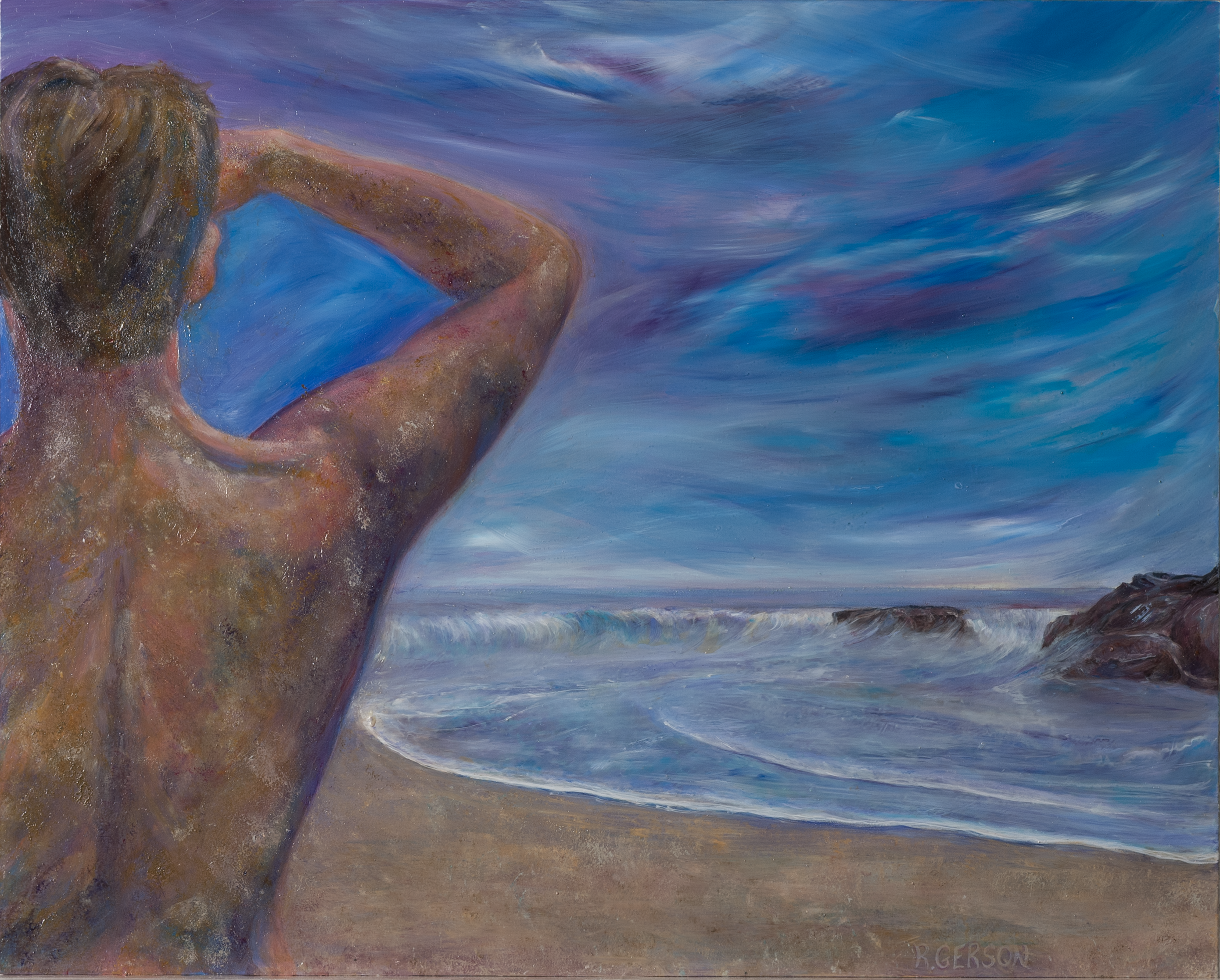 Swimmer at sunset on the beach