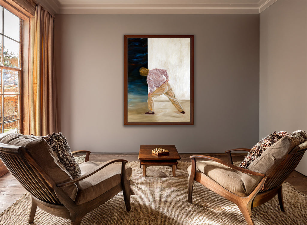 Living room with coffee table, and a painting by artist Robert Gerson on the wall.